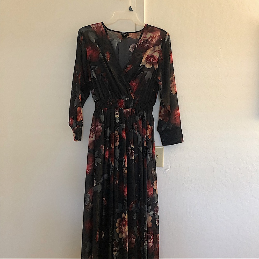 Floral navy dress. Sheer material, with slight lining at bottom